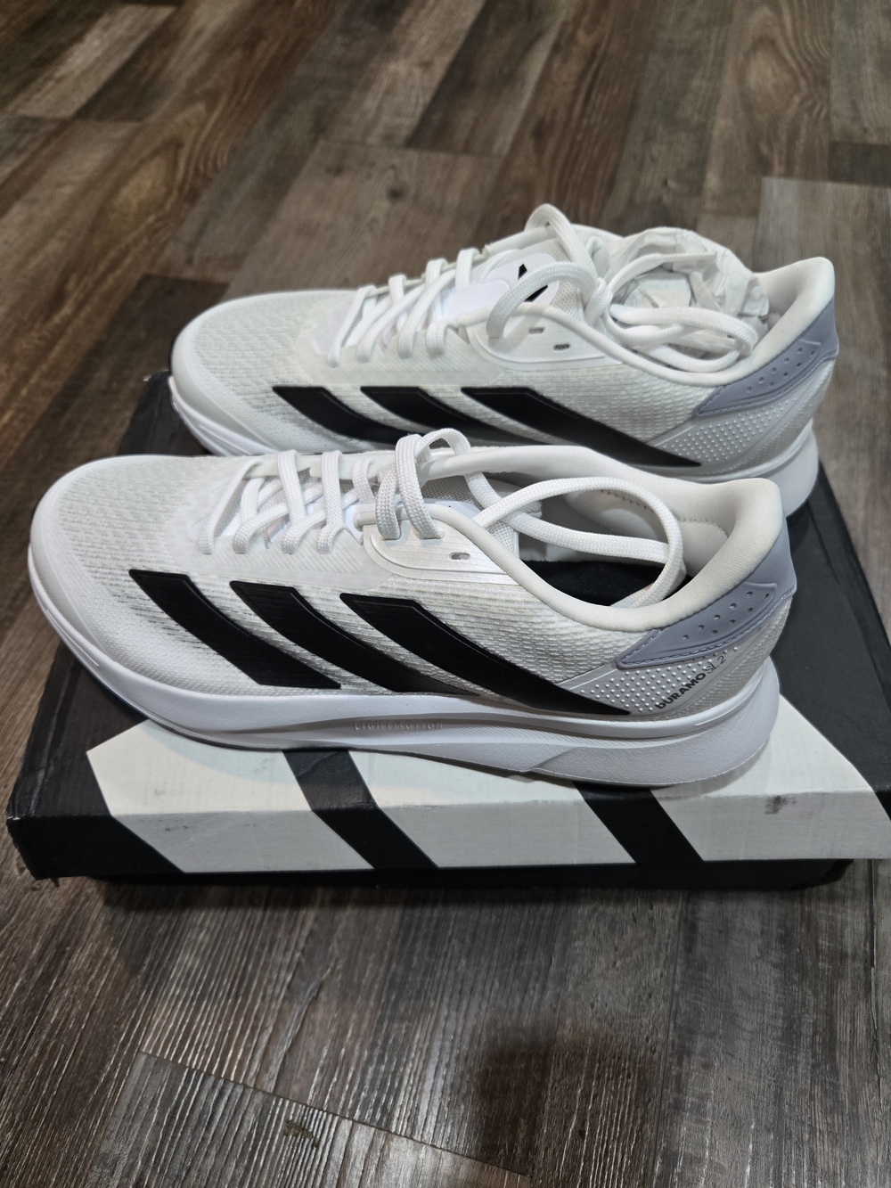 adidas Men’s White Sneakers with Black Stripes